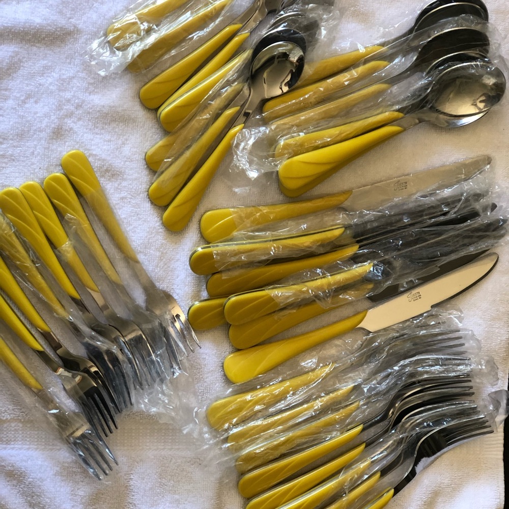 Yellow Fiestaware place setting of 8 -1 knife.
